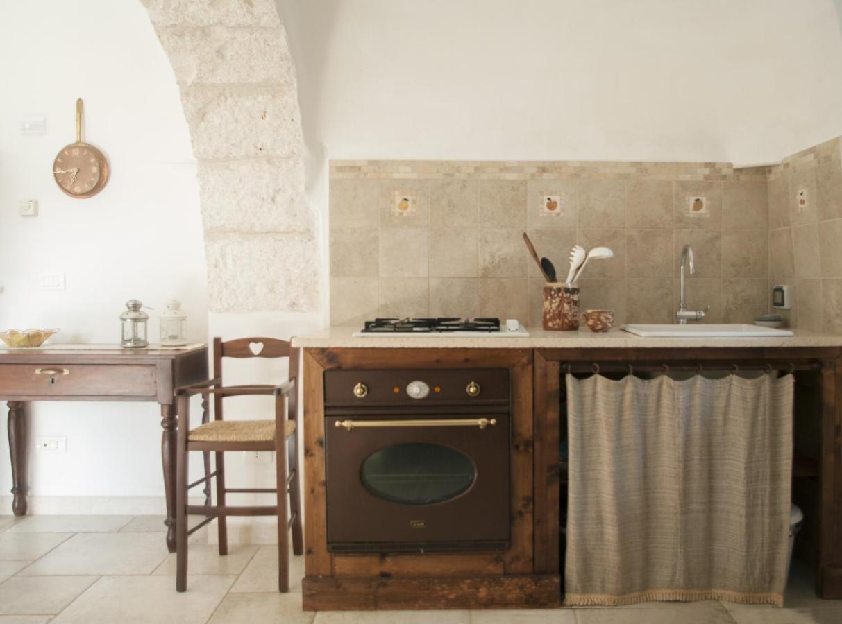 Trulli sul vignale in Masseria Santalachicca Martina Franca Esterno foto